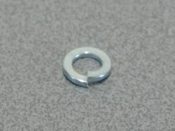 Spring washer ESD coin acceptor